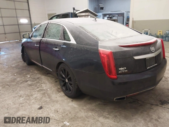 2013 Cadillac XTS Luxury with VIN 2G61P5S34D9200849, listed as a IAAI auction lot 41412189 with 134,932 mi miles. Bid and sale history available at carsss.com. Image 3.
