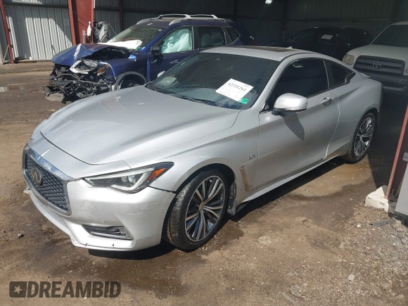 2019 Infiniti Q60 Luxe with VIN JN1EV7EL7KM290268, listed as a IAAI auction lot 42331261 with 95,402 mi miles and . Bid and sale history available at DreamBid. Image 2.