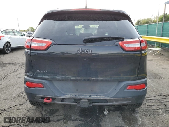 2015 Jeep Cherokee Trailhawk with VIN 1C4PJMBS9FW521872, listed as a Copart auction lot 55338955 with 146,602 mi miles and Salvage title. Bid and sale history available at DreamBid. Image 6.