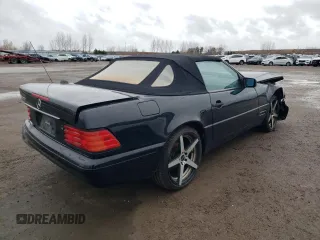 1997 Mercedes-Benz SL-Class with VIN WDBFA63F5VF145337, listed as a Copart auction lot 79991204 with 134,424 mi miles and Salvage Title. Bid and sale history available at carsss.com. Image 3.