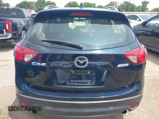 2016 Mazda CX-5 Sport z VIN JM3KE2BY0G0633611, wystawiony jako IAAI lot #42390654 z przebiegiem Nie podano mil oraz . Historia ofert i sprzedaży dostępna na DreamBid. Obrazek 17.