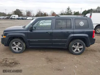 2016 Jeep Patriot Latitude with VIN 1C4NJRFBXGD524016, listed as a IAAI auction lot 40895673 with 157,465 mi miles. Bid and sale history available at carsss.com. Image 14.