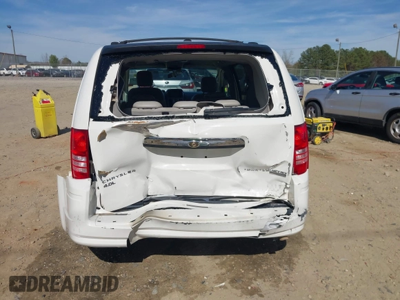 2009 Chrysler Town & Country Touring with VIN 2A8HR54X89R642118, listed as a IAAI auction lot 41844247 with 161,651 mi miles and . Bid and sale history available at DreamBid. Image 6.