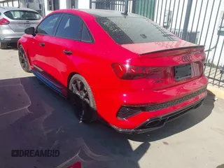 2023 Audi RS 3 with VIN WUAG4DGY0PA903200, listed as a IAAI auction lot 41839519 with 27,224 mi miles. Bid and sale history available at carsss.com. Image 3.