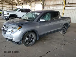 2017 Honda Ridgeline RTL-T with VIN 5FPYK2F6XHB011712, listed as a Copart auction lot 58451145 with 147,720 mi miles and Salvage title. Bid and sale history available at DreamBid. Image 1.