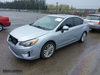 2012 Subaru Impreza Sedan 2.0i Premium with VIN JF1GJAD64CH012406, listed as a IAAI auction lot 41993378 with 96,706 mi miles. Bid and sale history available at carsss.com. Image 2.