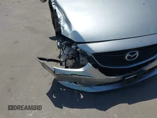 2017 Mazda Mazda6 Sport with VIN JM1GL1U50H1104088, listed as a IAAI auction lot 42000631 with 105,710 mi miles. Bid and sale history available at carsss.com. Image 6.
