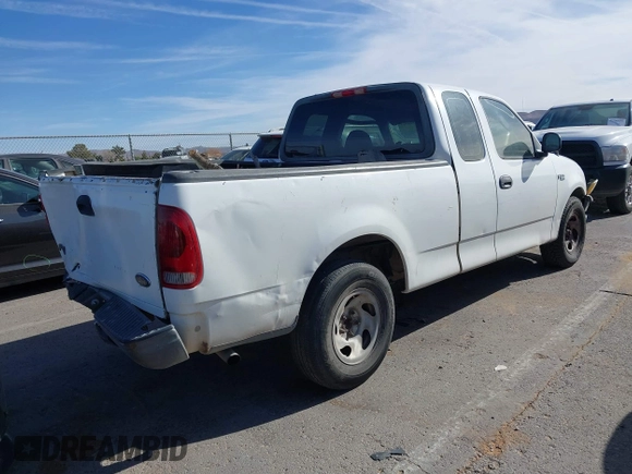 2003 Ford F-150 XL with VIN 1FTRX17213NA81064, listed as a IAAI auction lot 41796923 with 339,333 mi miles. Bid and sale history available at carsss.com. Image 4.