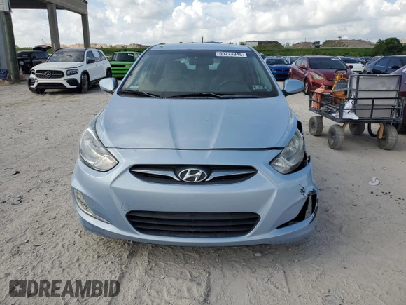 2012 Hyundai Accent SE with VIN KMHCU5AE3CU012287, listed as a Copart auction lot 60224945 with 62,583 mi miles and Salvage title. Bid and sale history available at DreamBid. Image 5.