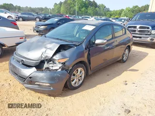 2010 Honda Insight EX with VIN JHMZE2H74AS027020, listed as a IAAI auction lot 42394875 with 248,003 mi miles and . Bid and sale history available at DreamBid. Image 2.