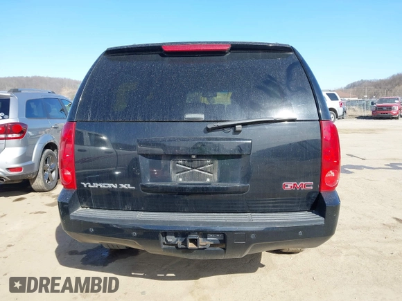 2014 GMC Yukon XL SLT with VIN 1GKS2KE79ER238831, listed as a IAAI auction lot 41767472 with 284,596 mi miles. Bid and sale history available at carsss.com. Image 16.