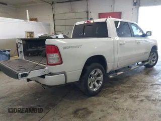 2021 Ram 1500 Big Horn with VIN 1C6SRFFTXMN780608, listed as a IAAI auction lot 41342815 with 70,406 mi miles and . Bid and sale history available at DreamBid. Image 4.