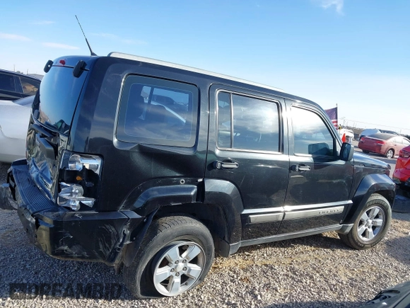 2011 Jeep Liberty Sport with VIN 1J4PN2GK2BW515322, listed as a IAAI auction lot 41597381 with 122,044 mi miles. Bid and sale history available at carsss.com. Image 13.