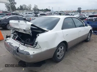 1998 Lexus ES 300 z VIN JT8BF28G0W5041081, wystawiony jako IAAI lot #42164998 z przebiegiem 151 272 mil mil oraz . Historia ofert i sprzedaży dostępna na DreamBid. Obrazek 4.