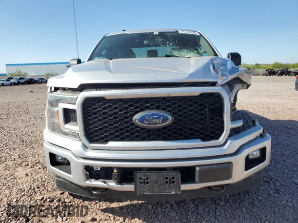 2019 Ford F-150 XL with VIN 1FTEW1EPXKKD82772, listed as a Copart auction lot 61176535 with 121,067 mi miles and Salvage title. Bid and sale history available at DreamBid. Image 5.