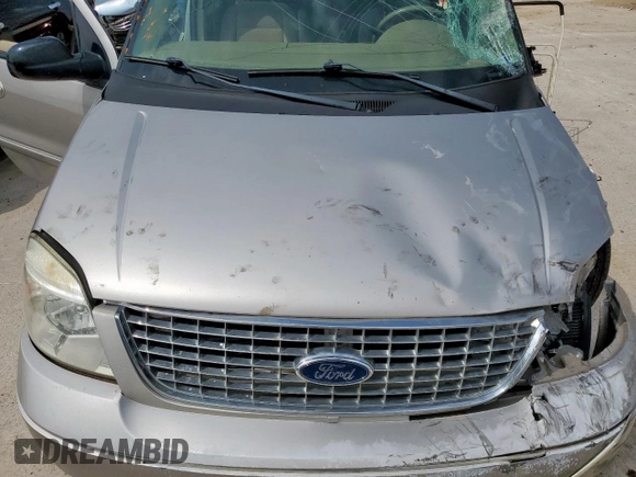 2004 Ford Freestar SEL z VIN 2FMZA52214BA84555, wystawiony jako Copart lot #54569535 z przebiegiem Nie podano mil oraz Szkoda całkowita • Salvage title. Historia ofert i sprzedaży dostępna na DreamBid. Obrazek 12.