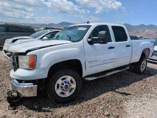 2012 GMC Sierra 2500HD SLE with VIN 1GT120CG2CF167243, listed as a Copart auction lot 59441605 with 96,314 mi miles and Salvage title. Bid and sale history available at DreamBid. Image 1.
