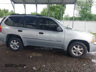 2007 GMC Envoy SLE z VIN 1GKDT13S272232176, wystawiony jako IAAI lot #42194144 z przebiegiem 160 461 mil mil oraz . Historia ofert i sprzedaży dostępna na DreamBid. Obrazek 13.