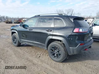 2020 Jeep Cherokee Trailhawk z VIN 1C4PJMBX5LD532516, wystawiony jako IAAI lot #41730502 z przebiegiem 85 543 mil mil oraz . Historia ofert i sprzedaży dostępna na DreamBid. Obrazek 3.