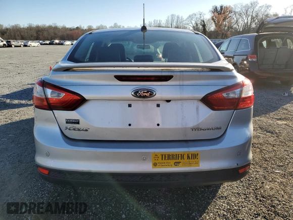 2013 Ford Focus Titanium with VIN 1FADP3J29DL148611, listed as a Copart auction lot 49645215 with 104,904 mi miles and Salvage Title. Bid and sale history available at carsss.com. Image 6.