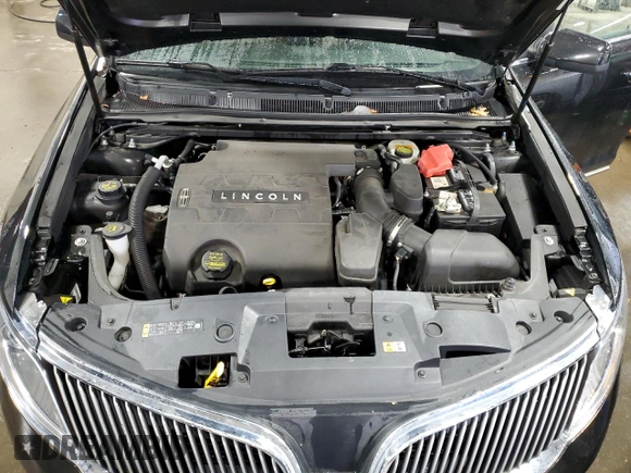 2013 Lincoln MKS with VIN 1LNHL9EK4DG615815, listed as a Copart auction lot 51675925 with 108,273 mi miles and Salvage title. Bid and sale history available at DreamBid. Image 12.