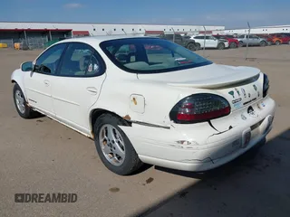 2003 Pontiac Grand Prix SE z VIN 1G2WK52J93F126127, wystawiony jako IAAI lot #42078346 z przebiegiem 236 183 mil mil oraz . Historia ofert i sprzedaży dostępna na DreamBid. Obrazek 3.