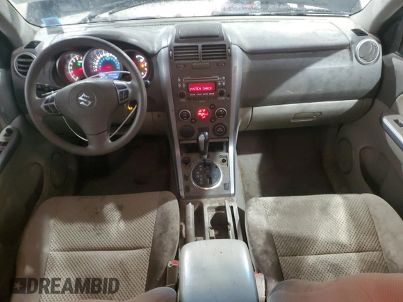 2011 Suzuki Grand Vitara Premium with VIN JS3TD0D28B4102673, listed as a Copart auction lot 43216005 with 141,726 mi miles and Salvage title. Bid and sale history available at DreamBid. Image 8.
