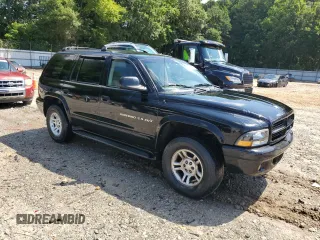 2001 Dodge Durango with VIN 1B4HS28Z91F580906, listed as a Copart auction lot 62870635 with 192,231 mi miles and Salvage title. Bid and sale history available at DreamBid. Image 4.