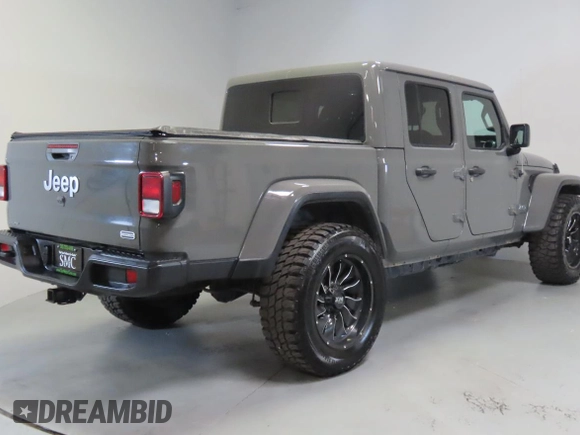 2020 Jeep Gladiator Overland z VIN 1C6HJTFG5LL169558, wystawiony jako Copart lot #60276825 z przebiegiem 102 866 mil mil oraz Czysty tytuł • Clean title. Historia ofert i sprzedaży dostępna na DreamBid. Obrazek 3.