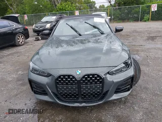 2023 BMW 4 Series 430i with VIN WBA23AT03PCL21070, listed as a IAAI auction lot 42730718 with 19,859 mi miles and . Bid and sale history available at DreamBid. Image 12.