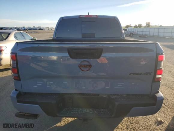 2023 Nissan Frontier PRO-4X with VIN 1N6ED1EK4PN669702, listed as a Copart auction lot 41687475 with 8,855 mi miles and Salvage Title. Bid and sale history available at carsss.com. Image 6.