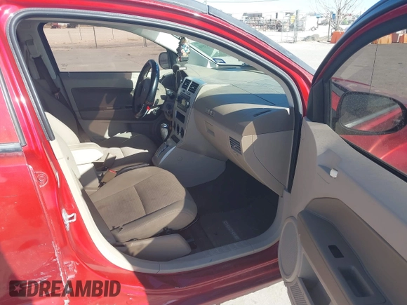 2008 Dodge Caliber SXT with VIN 1B3HB48B68D571783, listed as a IAAI auction lot 41653896 with 159,659 mi miles. Bid and sale history available at carsss.com. Image 5.