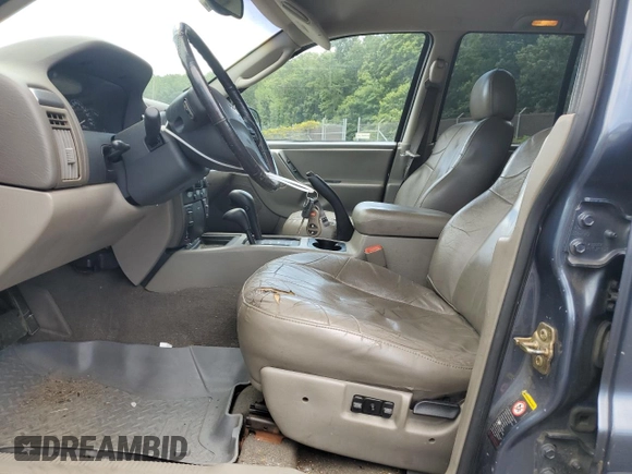 2002 Jeep Grand Cherokee with VIN 1J8GW48N42C183028, listed as a Copart auction lot 66677114 with 230,146 mi miles and Salvage title. Bid and sale history available at DreamBid. Image 7.