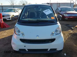 2009 Smart fortwo Pure z VIN WMEEJ31X99K292492, wystawiony jako IAAI lot #41029051 z przebiegiem 57 741 mil mil oraz . Historia ofert i sprzedaży dostępna na DreamBid. Obrazek 12.