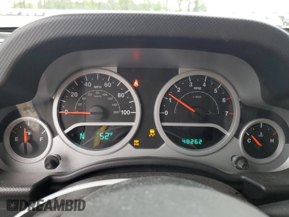 2010 Jeep Wrangler Sport with VIN 1J4AA2D12AL130050, listed as a Copart auction lot 54736025 with 48,262 mi miles and Salvage Title. Bid and sale history available at carsss.com. Image 9.