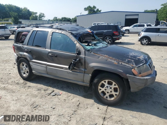1999 Jeep Grand Cherokee Laredo с VIN 1J4G258S9XC758711, выставлен на аукционе Copart как лот 58420835 с пробегом Не указан миль и Списание • Salvage title. История ставок и продаж доступна на DreamBid. Изображение 4.