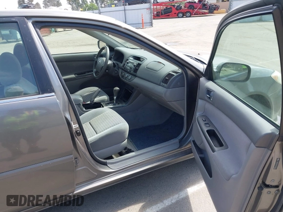 2005 Toyota Camry LE with VIN 4T1BF32K35U590150, listed as a IAAI auction lot 42053337 with 180,627 mi miles and . Bid and sale history available at DreamBid. Image 5.