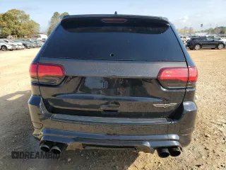 2018 Jeep Grand Cherokee Trackhawk with VIN 1C4RJFN93JC223647, listed as a Copart auction lot 51947265 with Not provided miles and Non repairable. Bid and sale history available at DreamBid. Image 6.
