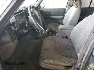 1998 Jeep Cherokee Sport with VIN 1J4FJ68S0WL152197, listed as a Copart auction lot 52512605 with Not provided miles and Salvage title. Bid and sale history available at DreamBid. Image 7.