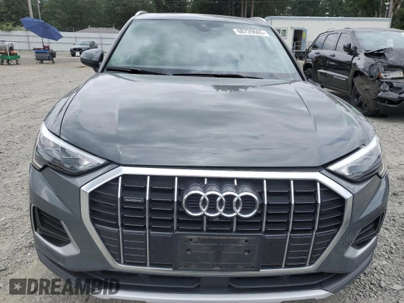 2020 Audi Q3 Premium with VIN WA1AECF31L1002342, listed as a Copart auction lot 60729665 with 29,154 mi miles and Salvage title. Bid and sale history available at DreamBid. Image 5.