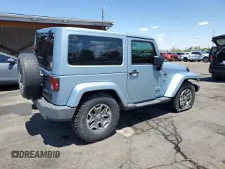 2012 Jeep Wrangler Arctic z VIN 1C4AJWBGXCL156600, wystawiony jako Copart lot #56369065 z przebiegiem 216 808 mil mil oraz Szkoda całkowita • Salvage title. Historia ofert i sprzedaży dostępna na DreamBid. Obrazek 3.