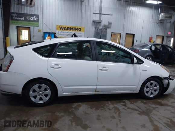 2008 Toyota Prius z VIN JTDKB20UX83407612, wystawiony jako IAAI lot #41141030 z przebiegiem 240 479 mil mil oraz . Historia ofert i sprzedaży dostępna na DreamBid. Obrazek 13.