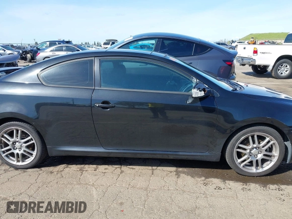 2009 Scion tC with VIN JTKDE167090284572, listed as a IAAI auction lot 41808769 with 132,474 mi miles. Bid and sale history available at carsss.com. Image 13.