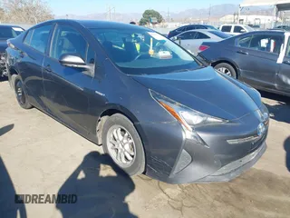 2016 Toyota Prius Two z VIN JTDKBRFU6G3013278, wystawiony jako IAAI lot #40834673 z przebiegiem 171 131 mil mil oraz . Historia ofert i sprzedaży dostępna na DreamBid. Obrazek 1.
