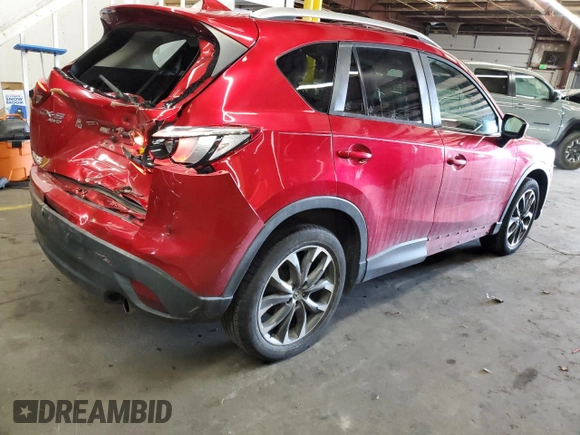 2016 Mazda CX-5 Grand Touring with VIN JM3KE4DY1G0669316, listed as a Copart auction lot 79961554 with 117,454 mi miles and Salvage Title. Bid and sale history available at carsss.com. Image 3.