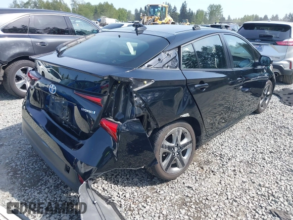 2021 Toyota Prius L Eco with VIN JTDKAMFU8M3136565, listed as a IAAI auction lot 42161896 with 39,634 mi miles and . Bid and sale history available at DreamBid. Image 4.