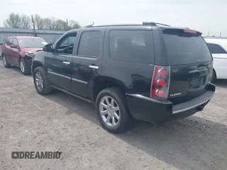 2014 GMC Yukon Denali z VIN 1GKS1EEFXER113493, wystawiony jako IAAI lot #41742662 z przebiegiem 150 382 mil mil oraz . Historia ofert i sprzedaży dostępna na DreamBid. Obrazek 3.
