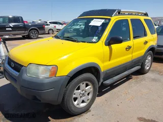 2003 Ford Escape XLT Popular 2 with VIN 1FMCU93143KC88233, listed as a IAAI auction lot 41929404 with 225,946 mi miles. Bid and sale history available at carsss.com. Image 2.