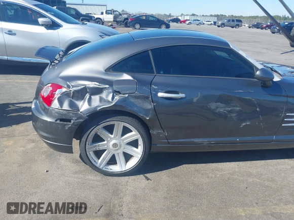 2005 Chrysler Crossfire Limited z VIN 1C3AN69L15X033940, wystawiony jako IAAI lot #41651049 z przebiegiem 88 450 mil mil oraz . Historia ofert i sprzedaży dostępna na DreamBid. Obrazek 6.