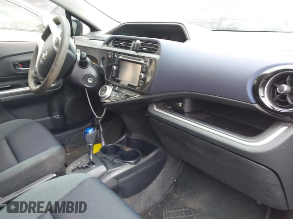 2016 Toyota Prius One with VIN JTDKDTB32G1120313, listed as a IAAI auction lot 42064787 with 63,464 mi miles and . Bid and sale history available at DreamBid. Image 5.
